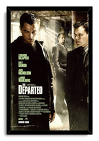 The Departed framed wall art print with a black border, three men in dramatic sepia lighting, and prominent white title typography.