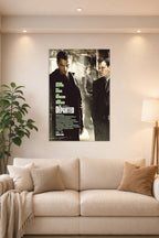 The Departed Movie Poster in a bright living room above a beige sofa.