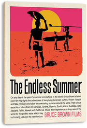 The Endless Summer canvas wall art print presents silhouetted surfers with longboards on an orange beach under a yellow sun.
