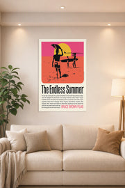 The Endless Summer Movie Poster in a bright living room above a beige sofa.