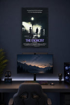 The Exorcist in a gaming desk setup above a monitor.