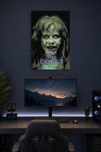 The Exorcist Movie Poster - Regan MacNeil in a gaming desk setup above a monitor.