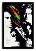 The Fast and the Furious framed wall art print features four stark cast portraits and a green sports car amid orange motion trails.