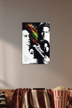 The Fast and the Furious Movie Cast in a cozy movie room above a brown sofa with popcorn.