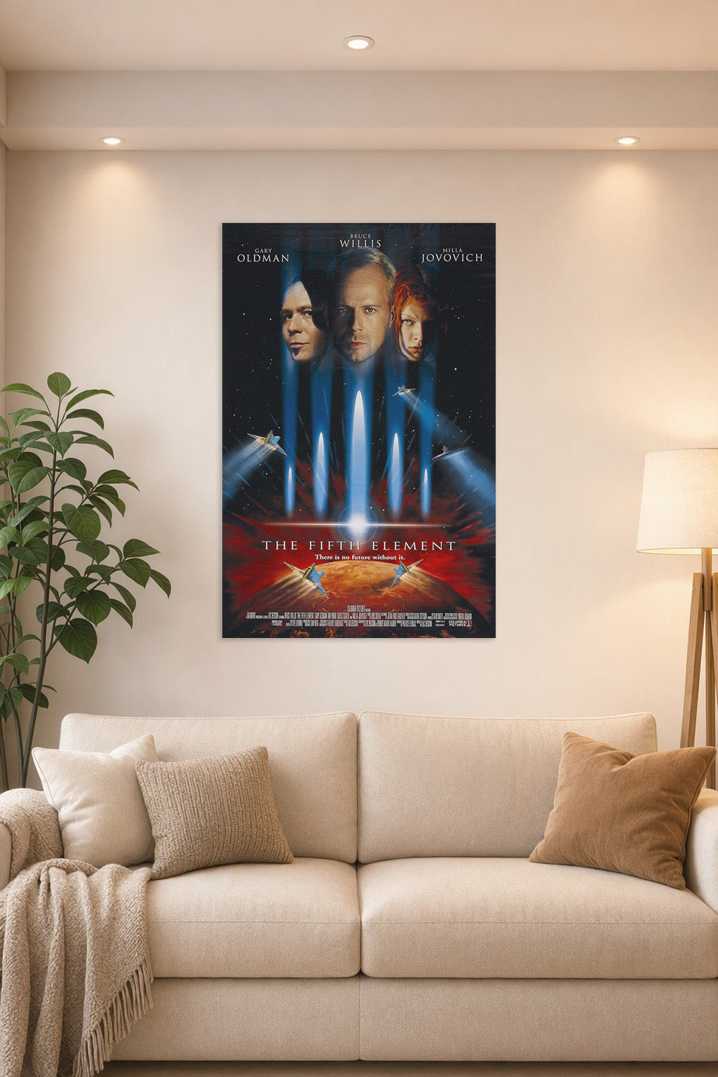 The Fifth Element Movie Poster in a bright living room above a beige sofa.