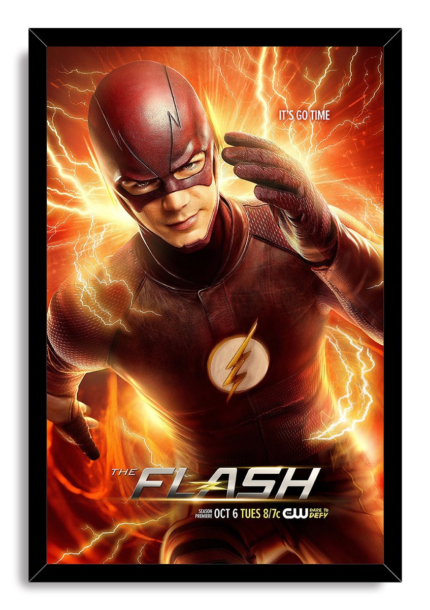 The Flash framed wall art print portrays the red-suited speedster reaching forward against a fiery orange lightning backdrop.