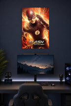 The Flash in a gaming desk setup above a monitor.