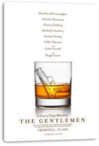 The Gentlemen canvas wall art print presents amber whiskey and a pistol-shaped ice cube in a tumbler on a clean white design.