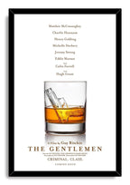 The Gentlemen framed wall art print pairs a black frame with a whiskey glass, gun-shaped ice cube, cast list, and title text.