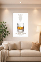 The Gentlemen Movie Poster in a bright living room above a beige sofa.