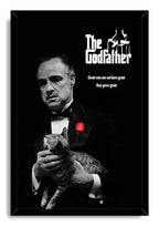 The Godfather framed wall art print portrays Vito Corleone holding a cat beneath white logo text, accented by a red rose.