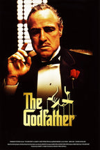 The Godfather poster features Vito Corleone in a black tuxedo with a red rose, posed before glowing window blinds.
