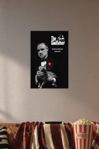 The Godfather in a cozy movie room above a brown sofa with popcorn.