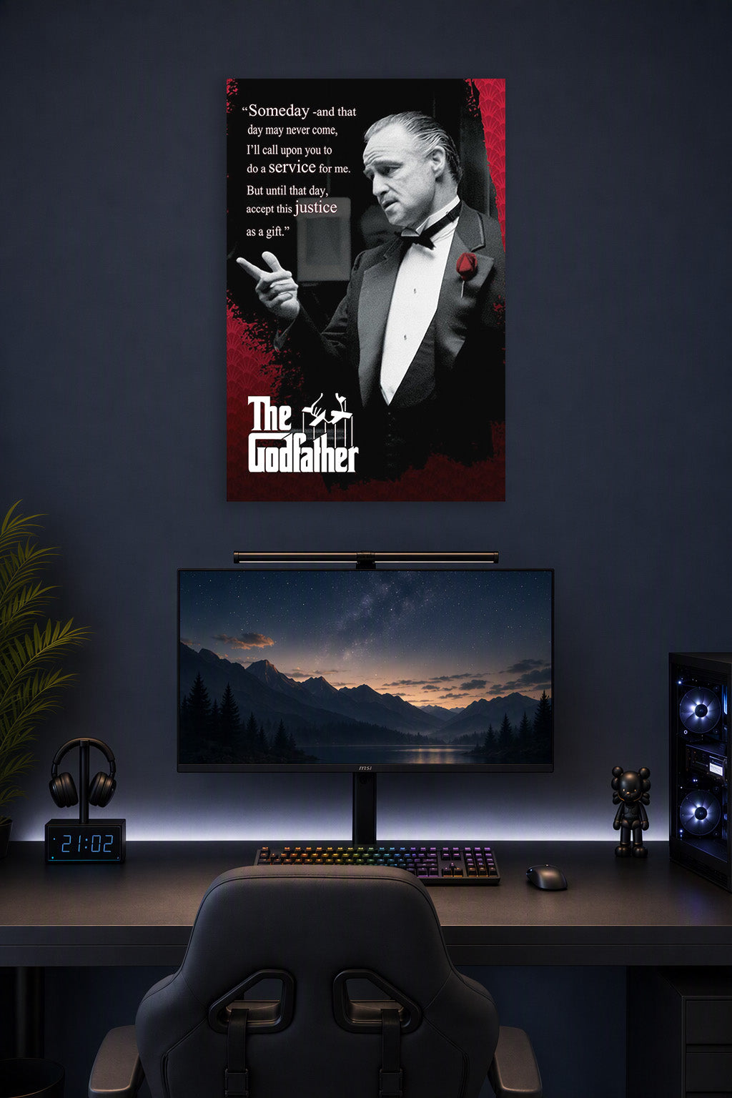 The Godfather Don Vito Corleone in a gaming desk setup above a monitor.