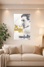 The Godfather Part II in a bright living room above a beige sofa.