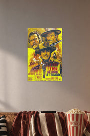 The Good The Bad The Ugly Movie Poster in a cozy movie room above a brown sofa with popcorn.