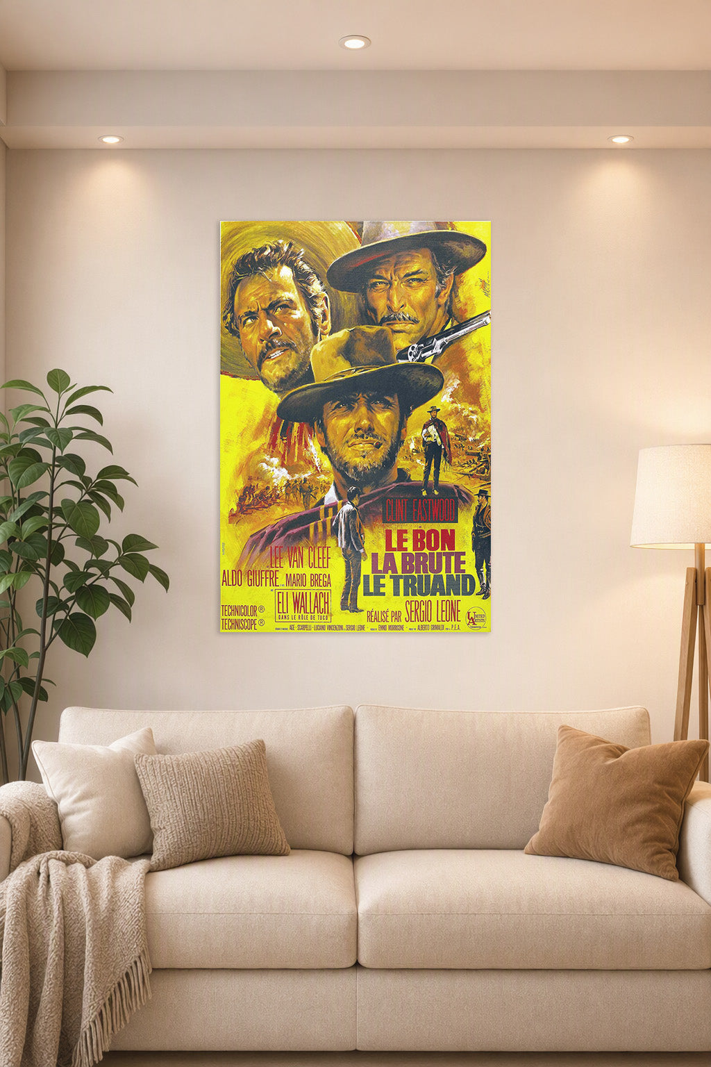 The Good The Bad The Ugly Movie Poster in a bright living room above a beige sofa.