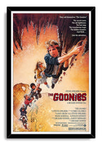 The Goonies framed wall art print features children suspended from a cave ceiling above an antique map in a black frame.