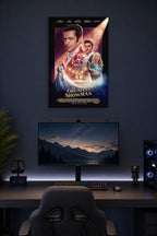 The Greatest Showman Movie Poster in a gaming desk setup above a monitor.