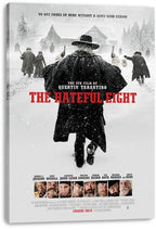 The Hateful Eight canvas wall art print presents a lone black-coated gunslinger in a blizzard before a remote cabin, with red title lettering.