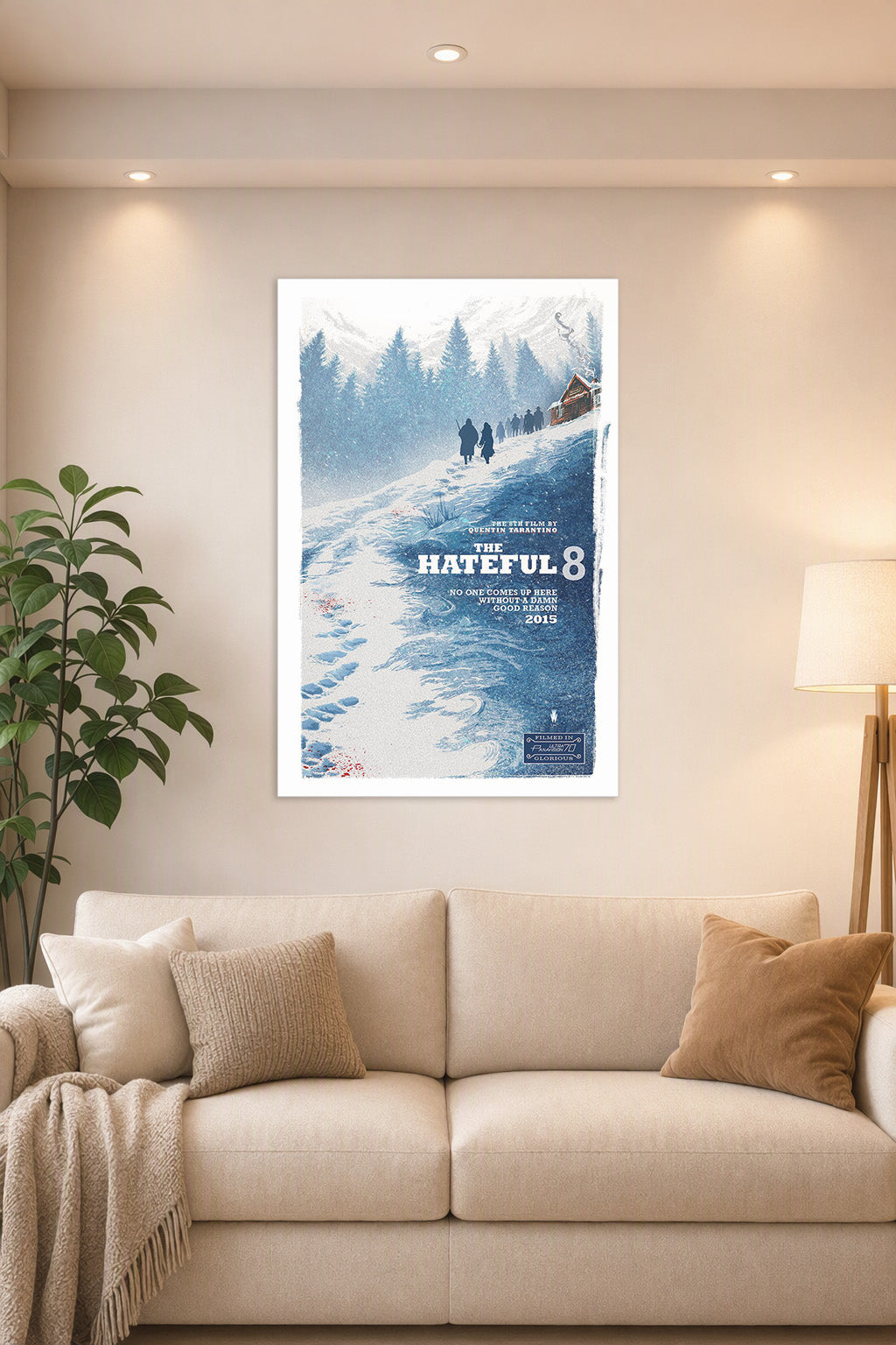 The Hateful Eight Movie Poster in a bright living room above a beige sofa.