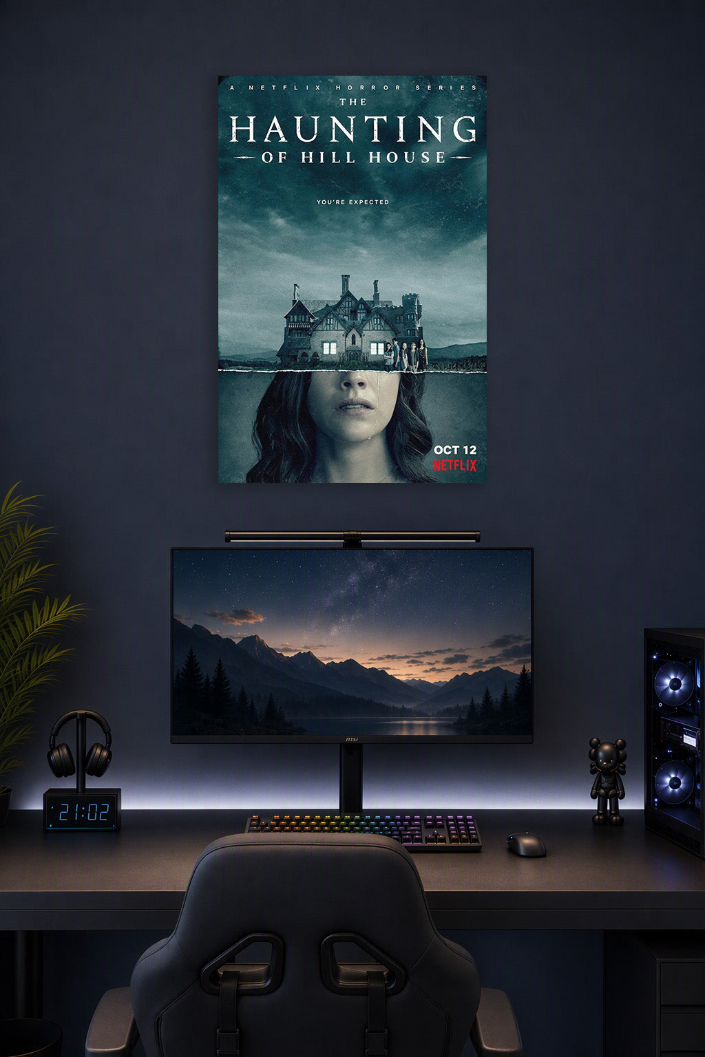 The Haunting of Hill House in a gaming desk setup above a monitor.