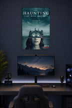The Haunting of Hill House in a gaming desk setup above a monitor.