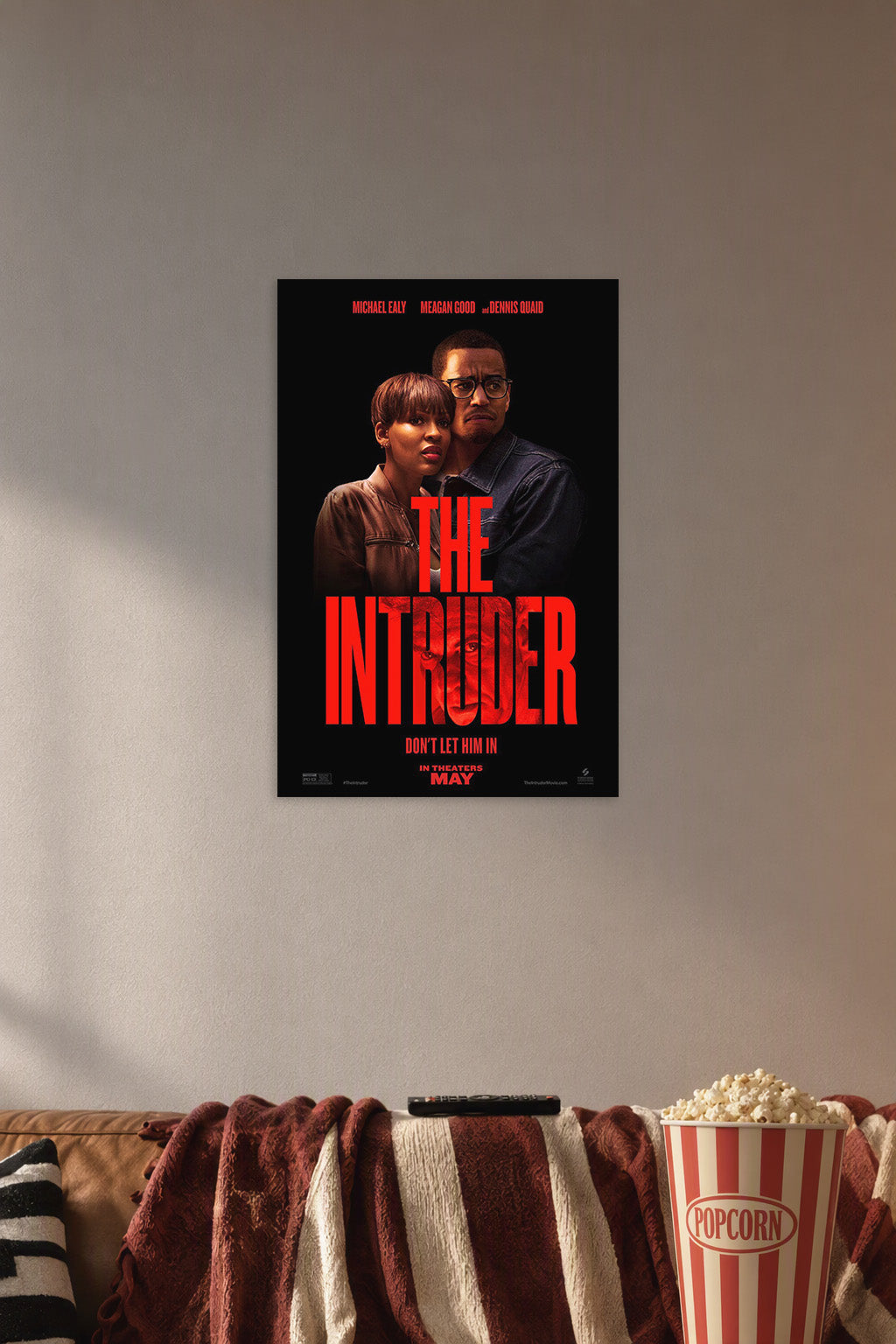 The Intruder Movie Poster Michael Ealy Meagan Good Dennis Quaid in a cozy movie room above a brown sofa with popcorn.