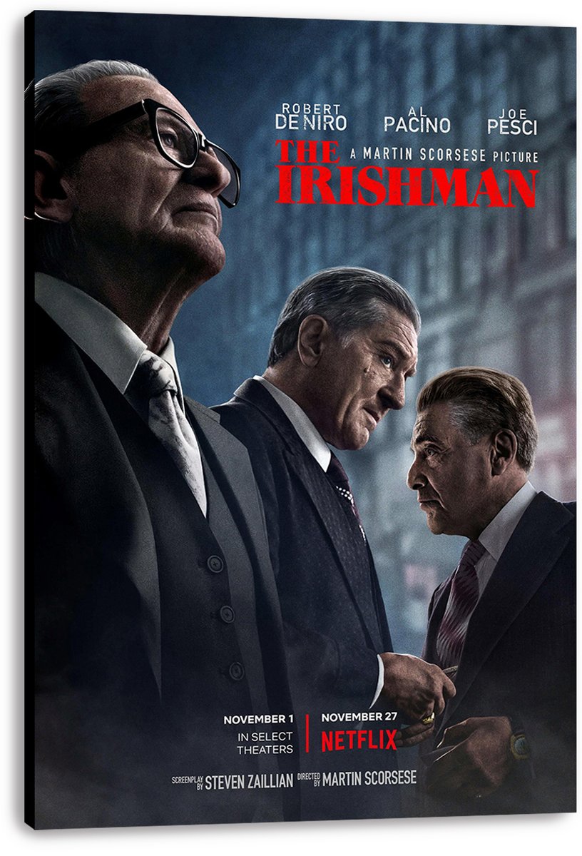 The Irishman canvas wall art print with three stern men in suits, red title lettering, and visible wrapped canvas edges.