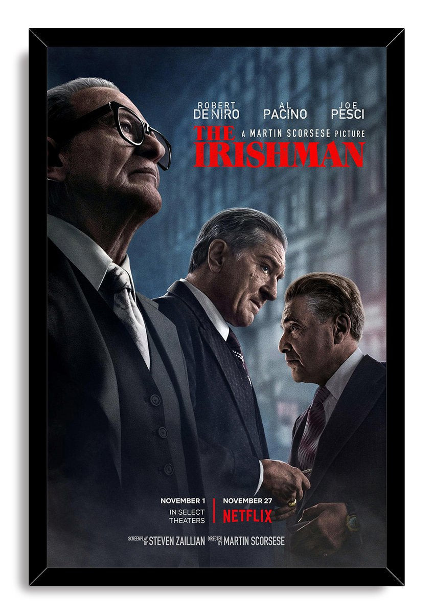 The Irishman framed wall art print featuring three men in dark suits, a blue-gray backdrop, red title text, and a black frame.