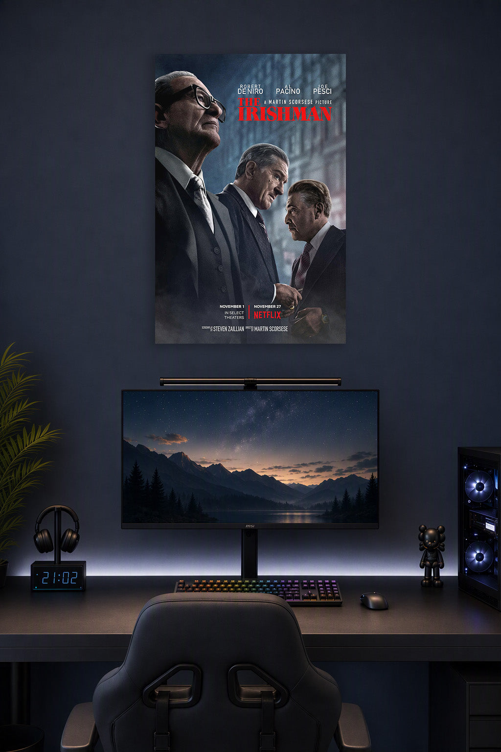 The Irishman Robert De Niro Al Pacino Joe Pesci Movie in a gaming desk setup above a monitor.