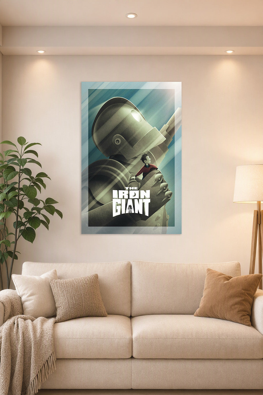 The Iron Giant Movie Poster in a bright living room above a beige sofa.