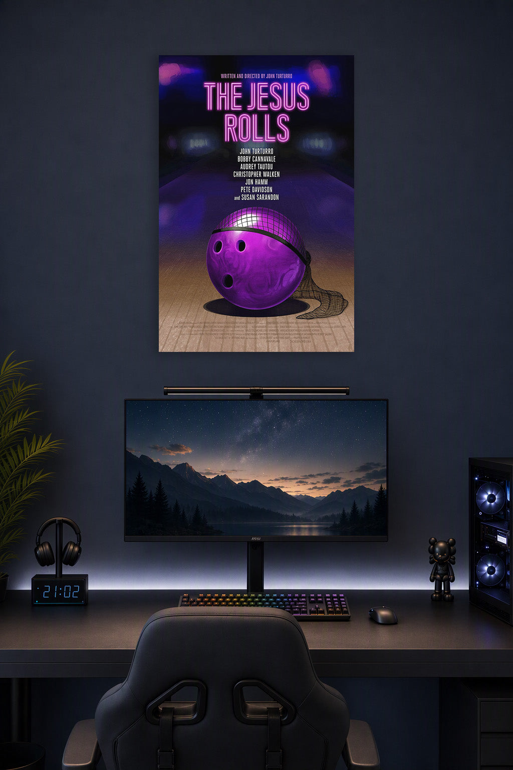The Jesus Rolls Movie Poster in a gaming desk setup above a monitor.