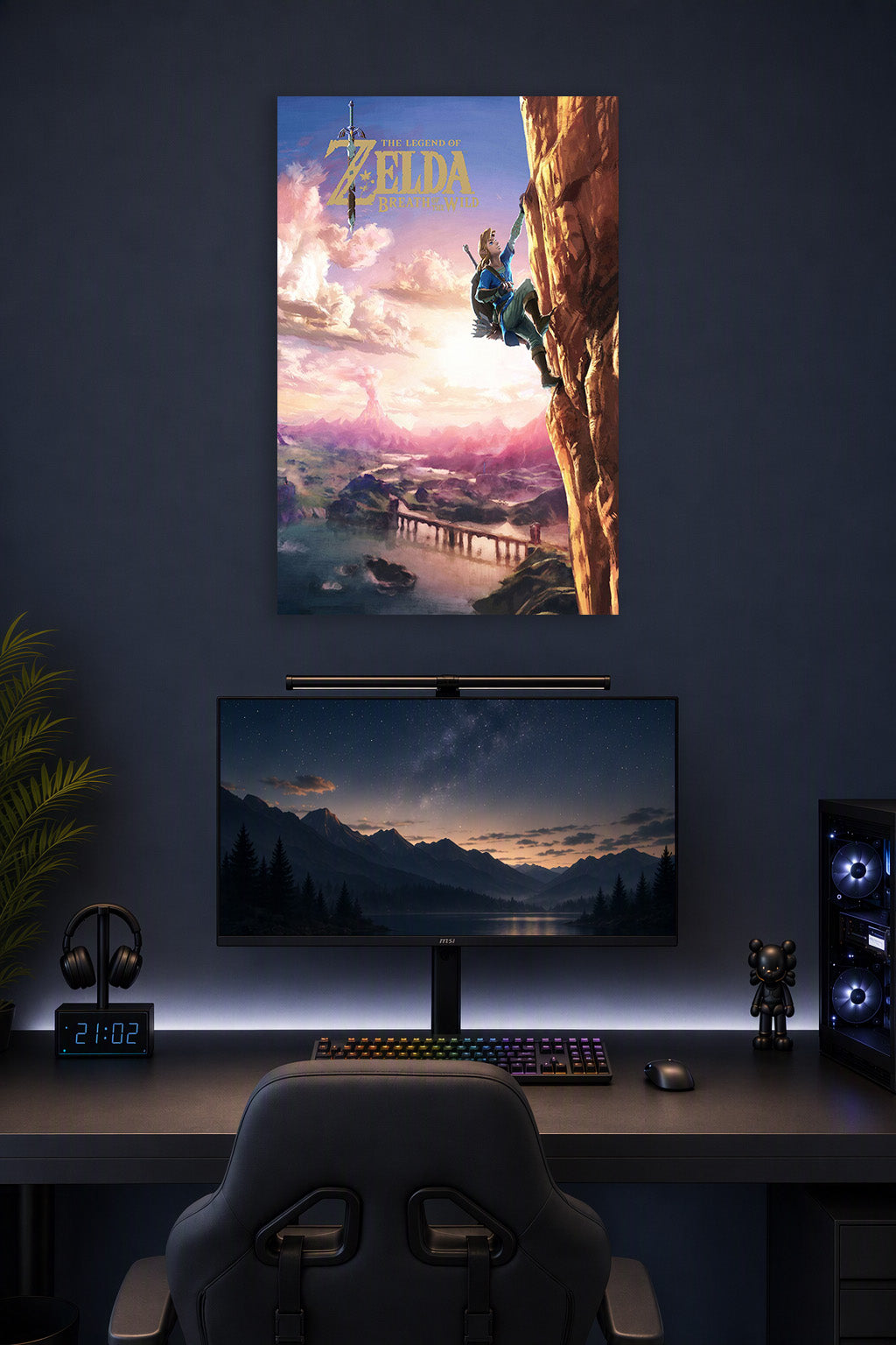 The Legend of Zelda Breath of the Wild Link Climbing in a gaming desk setup above a monitor.