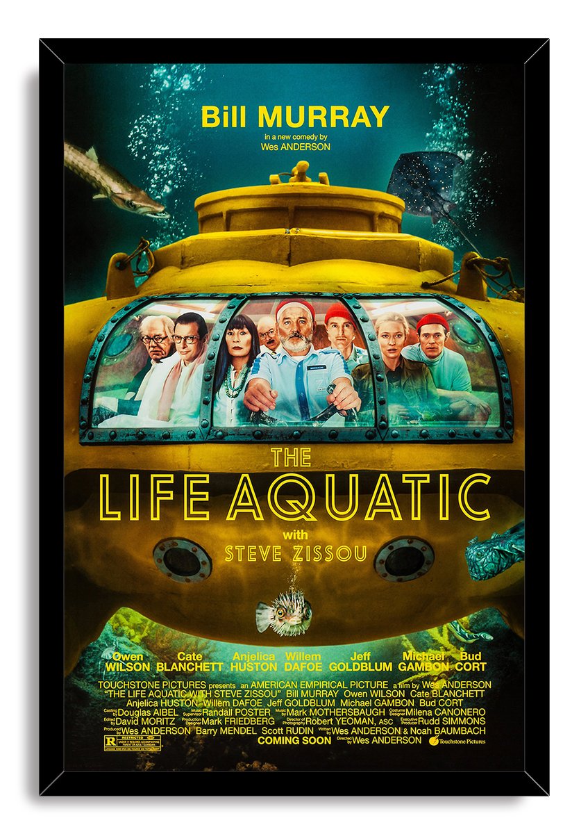 The Life Aquatic framed wall art print portrays Steve Zissou and his crew inside a yellow submarine amid sea life.