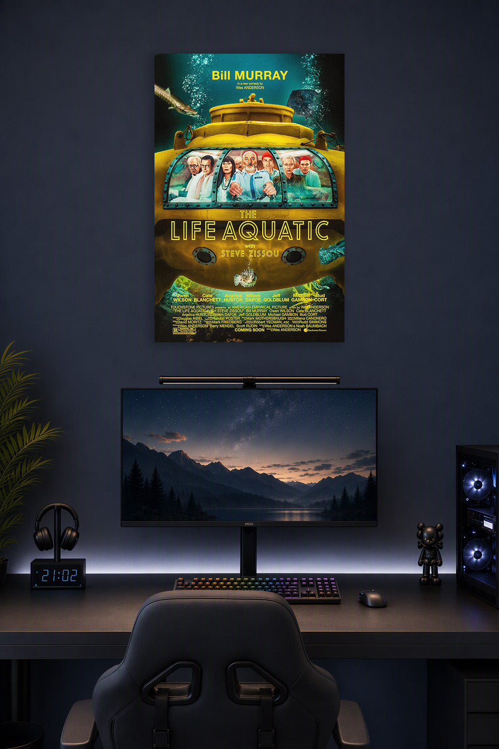 The Life Aquatic with Steve Zissou Movie Poster in a gaming desk setup above a monitor.