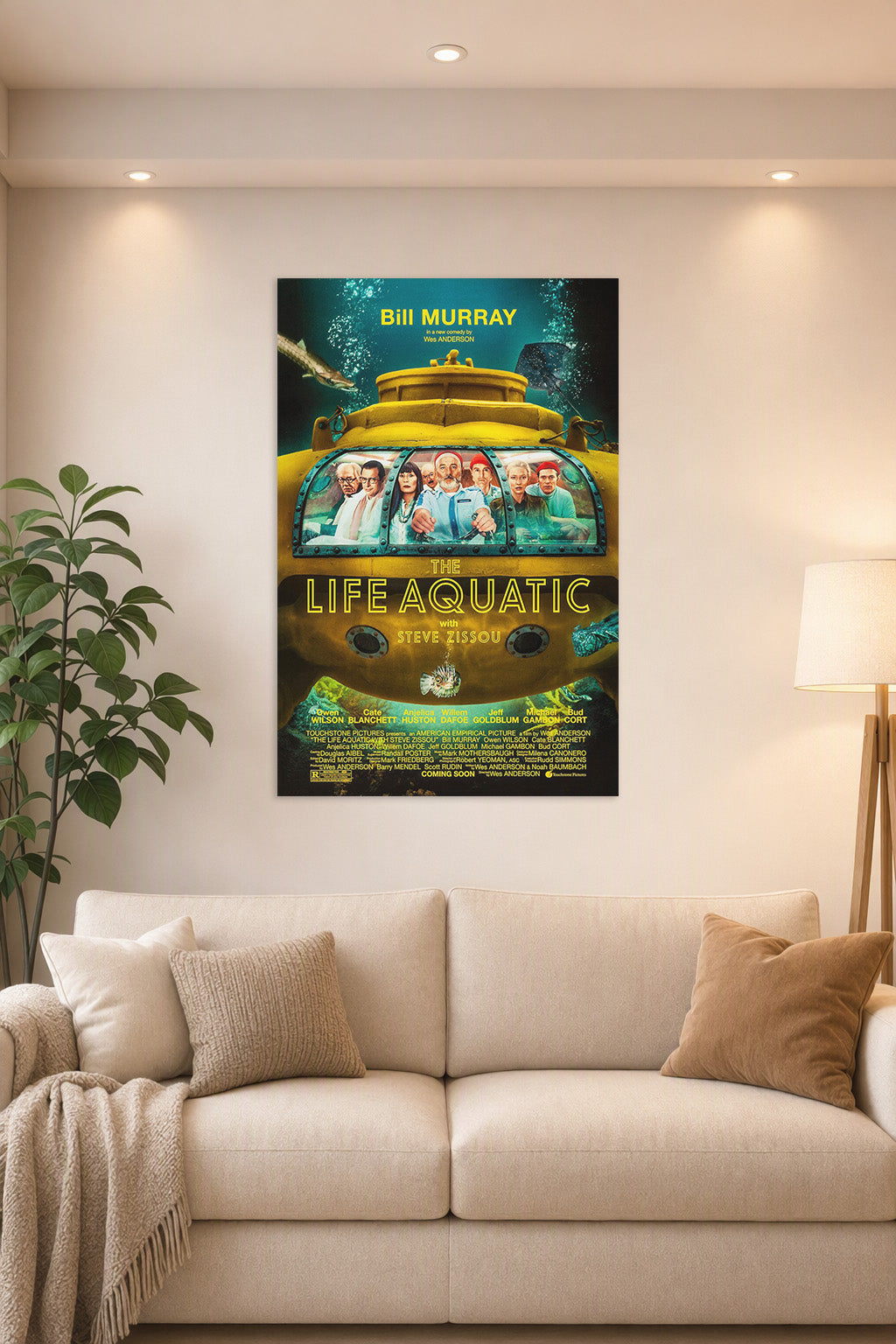 The Life Aquatic with Steve Zissou Movie Poster in a bright living room above a beige sofa.