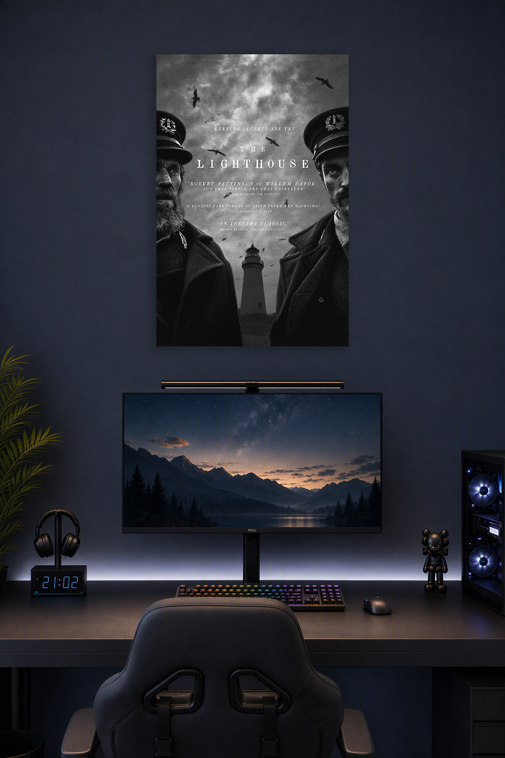The Lighthouse Movie in a gaming desk setup above a monitor.