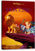 The Lion King canvas wall art print displays Mufasa and the animated cast gathered on Pride Rock beneath a glowing orange sky.