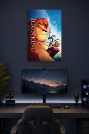 The Lion King in a gaming desk setup above a monitor.