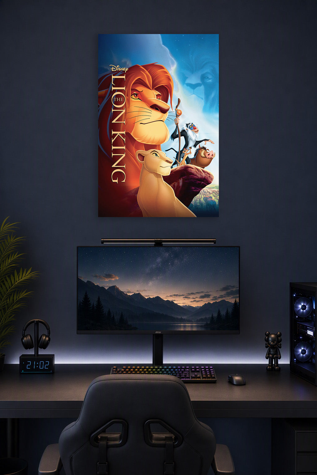 The Lion King in a gaming desk setup above a monitor.