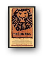 The Lion King framed wall art print features the iconic black lion graphic, distressed brown border, and Broadway theater text.