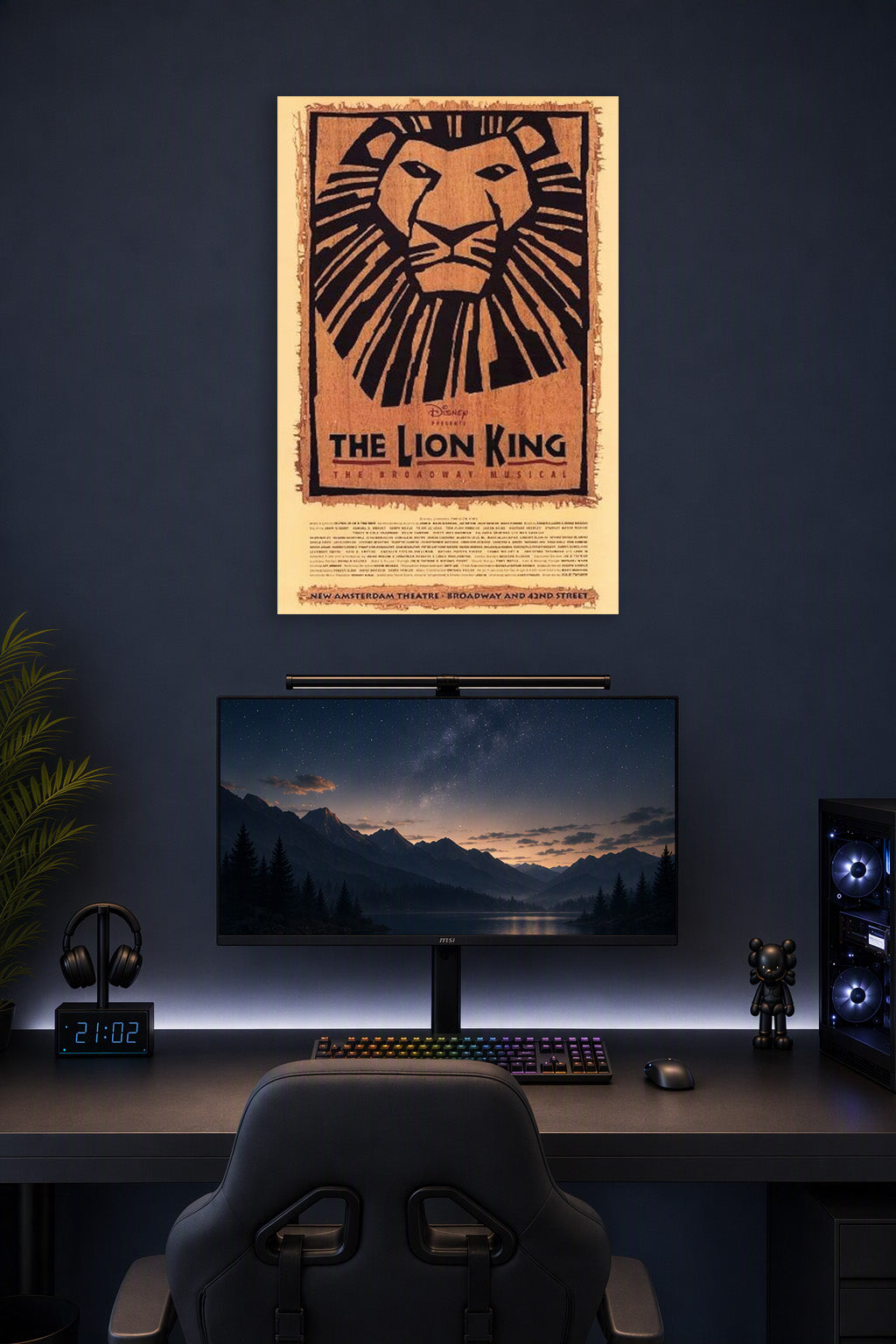 The Lion King The Broadway Musical Poster Broadway Theater Play in a gaming desk setup above a monitor.
