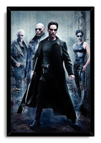 Framed The Matrix wall art print portrays Neo holding a rifle with Morpheus, Trinity, and Switch against cascading code.