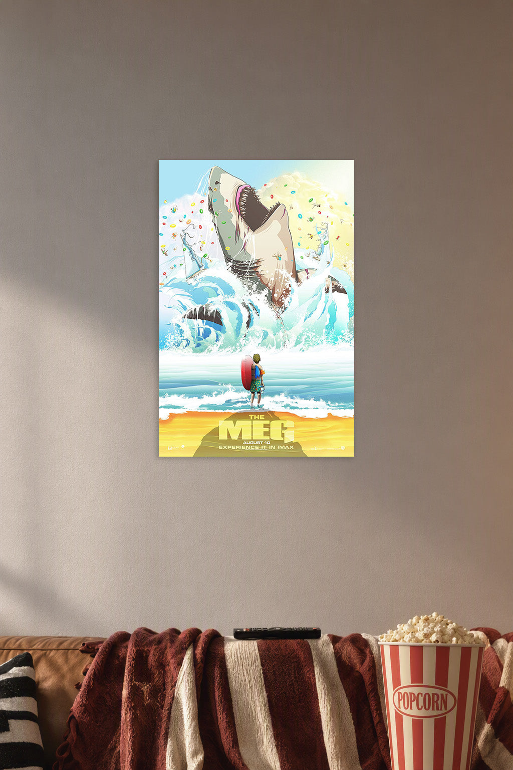 The Meg Giant Shark in a cozy movie room above a brown sofa with popcorn.