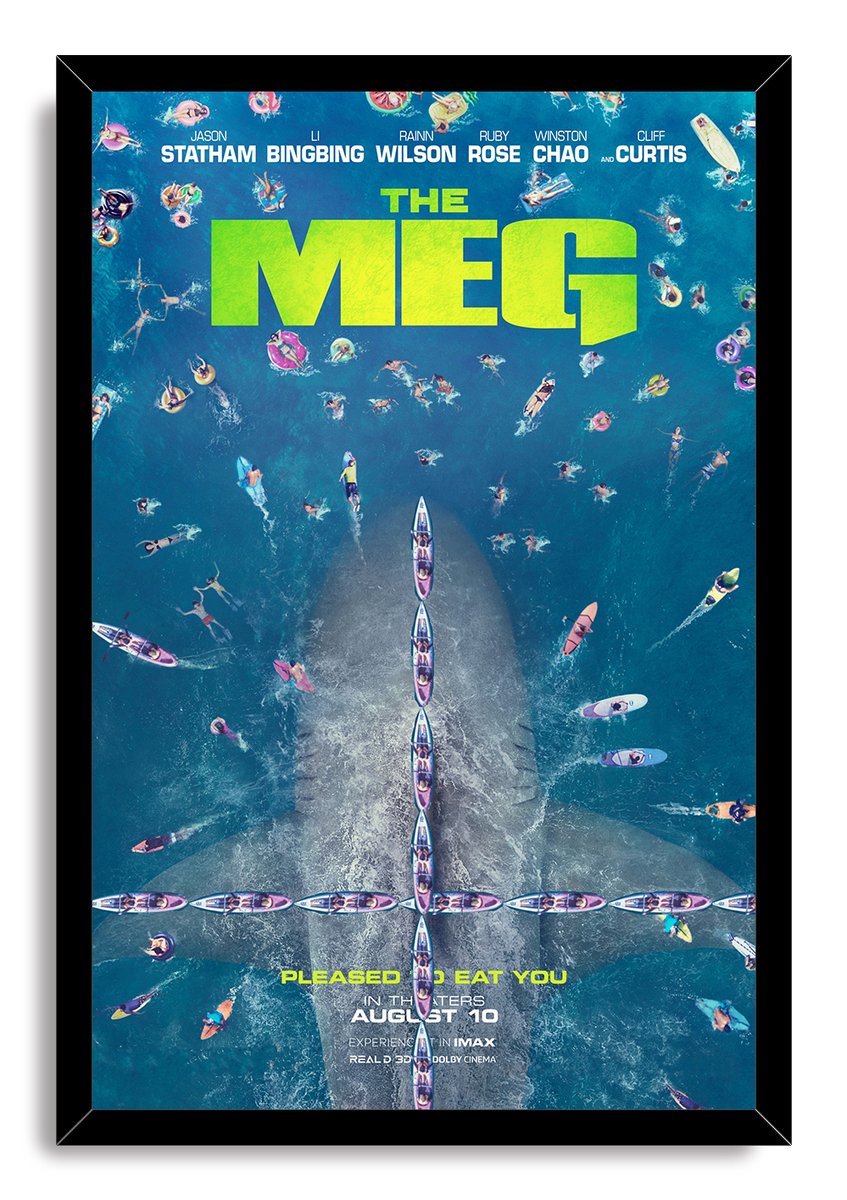 The Meg framed wall art print features a colossal shark under colorful watercraft and swimmers in a deep blue ocean scene.