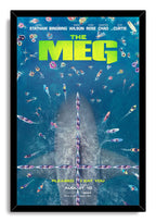 The Meg framed wall art print features a colossal shark under colorful watercraft and swimmers in a deep blue ocean scene.