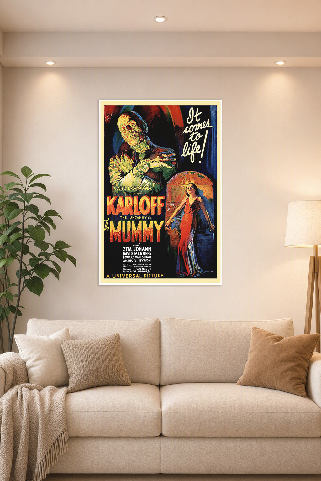 The Mummy (1932) Classic Horror Movie Poster in a bright living room above a beige sofa.