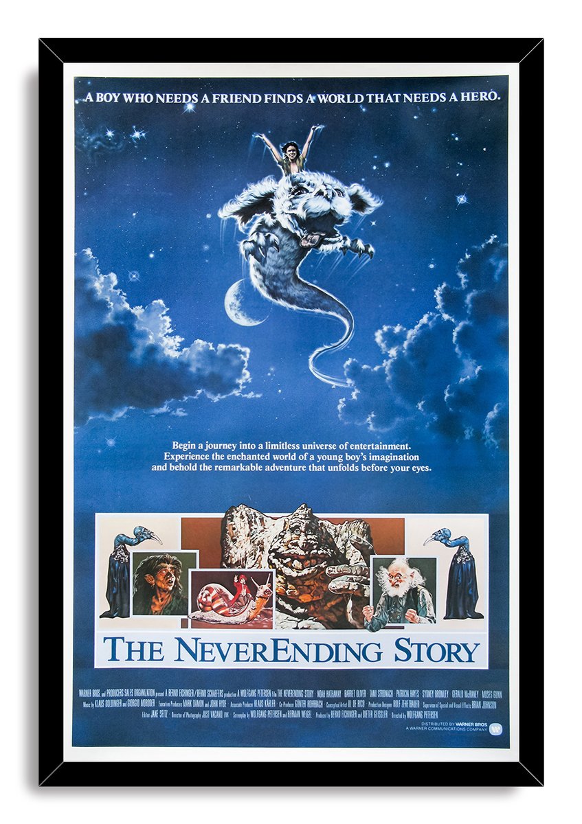 The NeverEnding Story framed wall art print presents a white luckdragon in a blue night sky with character portraits below.
