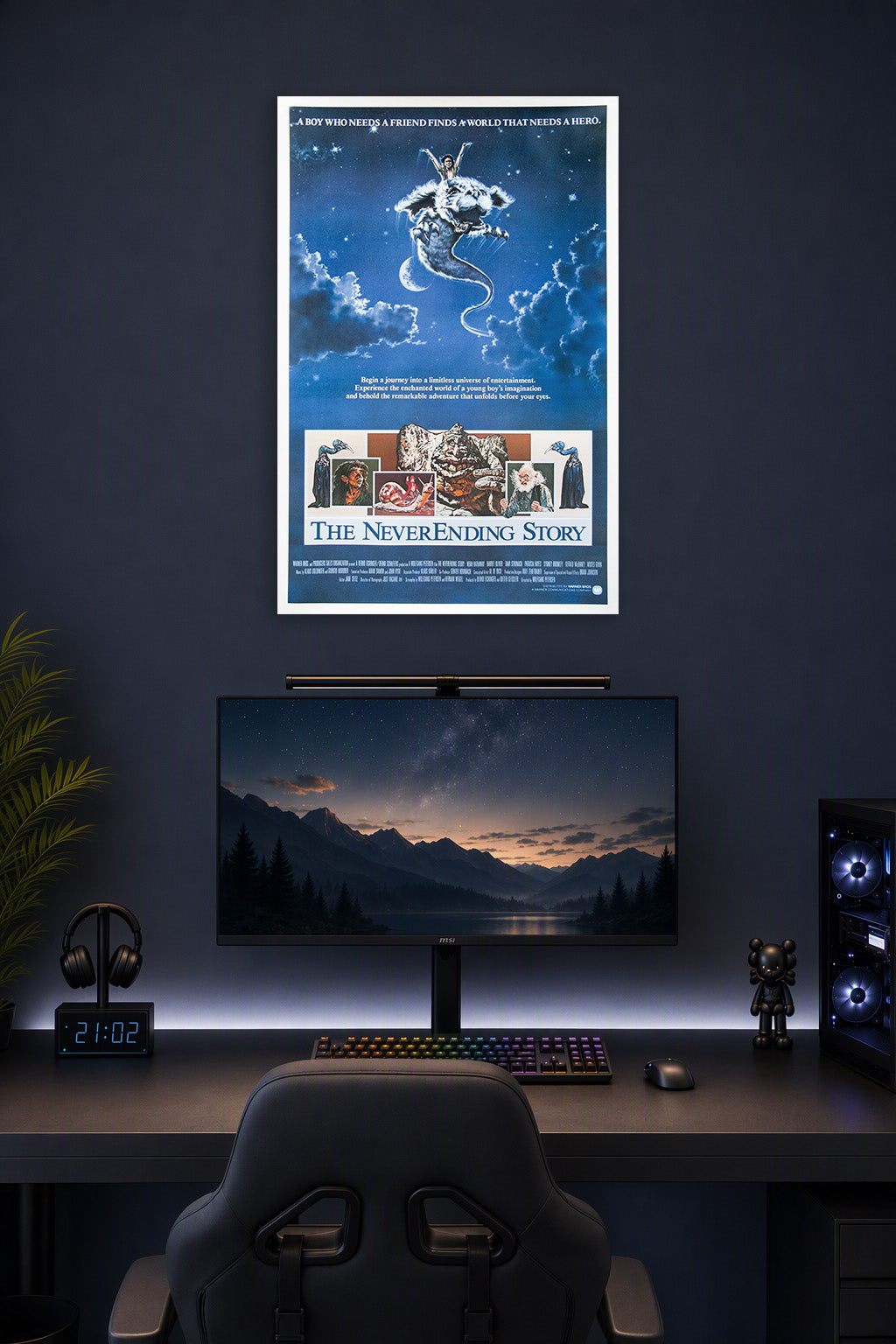 The NeverEnding Story in a gaming desk setup above a monitor.